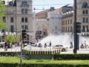 The wind blows the fountain's spray at Konigsplatz